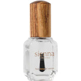 A clear glass bottle of Sienna Byron Bay Glossy Top Coat with a natural wooden cap, photographed on a white background.