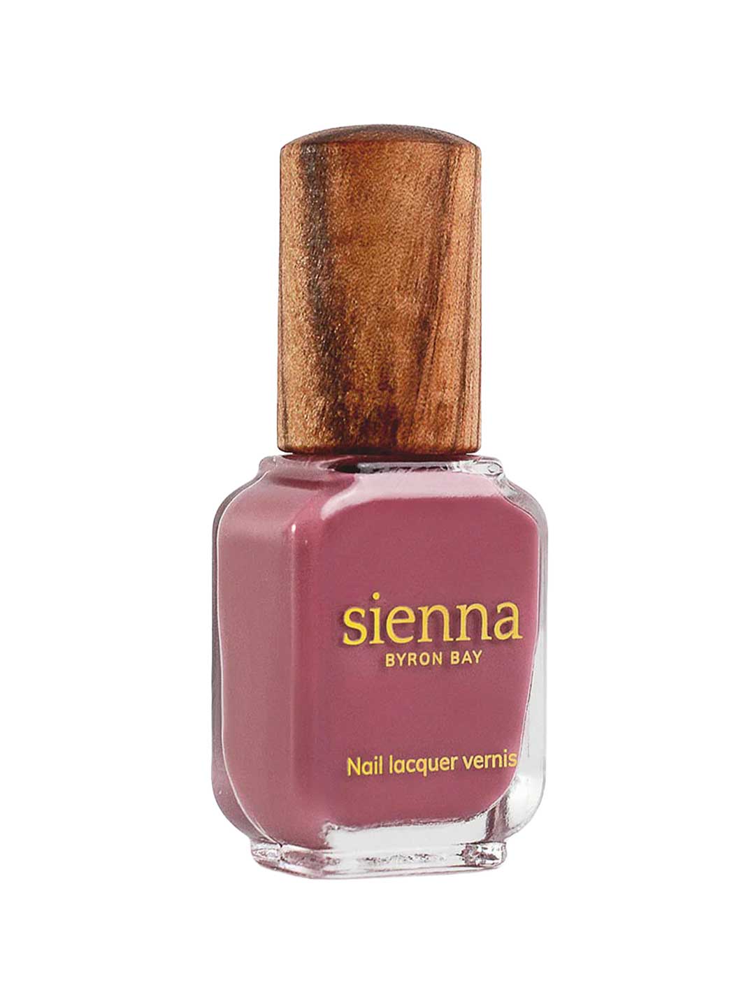 Sienna Byron Bay Heartspace is a nail lacquer with a wooden cap and mauve-pink polish, featuring gold lettering on the label.