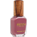 Sienna Byron Bay Heartspace is a nail lacquer with a wooden cap and mauve-pink polish, featuring gold lettering on the label.
