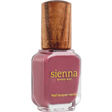 Sienna Byron Bay Heartspace is a nail lacquer with a wooden cap and mauve-pink polish, featuring gold lettering on the label.