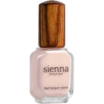 A bottle of Sienna Byron Bay Melody nail lacquer with light pink polish and a wooden-textured cap is shown against a white background.