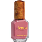 A bottle of Sienna Byron Bay - Blossom pink nail lacquer, featuring a wooden cap and gold lettering on the label, set against a white background.
