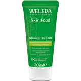 A green tube of Weleda Skin Food Shower Cream 200ml, a nourishing body wash for immediate nourishment and smooth, soft skin with 100% natural origin ingredients.