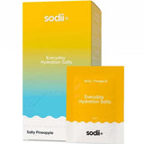 A yellow and white box and packet labeled Sodii Everyday Hydration Salts Salty Pineapple 30pk. The gradient blue and yellow packaging highlights these pineapple-flavored hydration electrolyte sachets.
