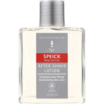The Speick Men Active After Shave Lotion 100ml comes in a clear rectangular bottle with a gray cap and a gray, white, and red label. It is vegan and designed to revitalize skin after shaving.