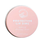 SunButter Protective Lip Zinc SPF15 Protea Tint 15ml closed tin on a white background