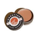 SunButter Tinted Sunscreen SPF50 open tin on a white background