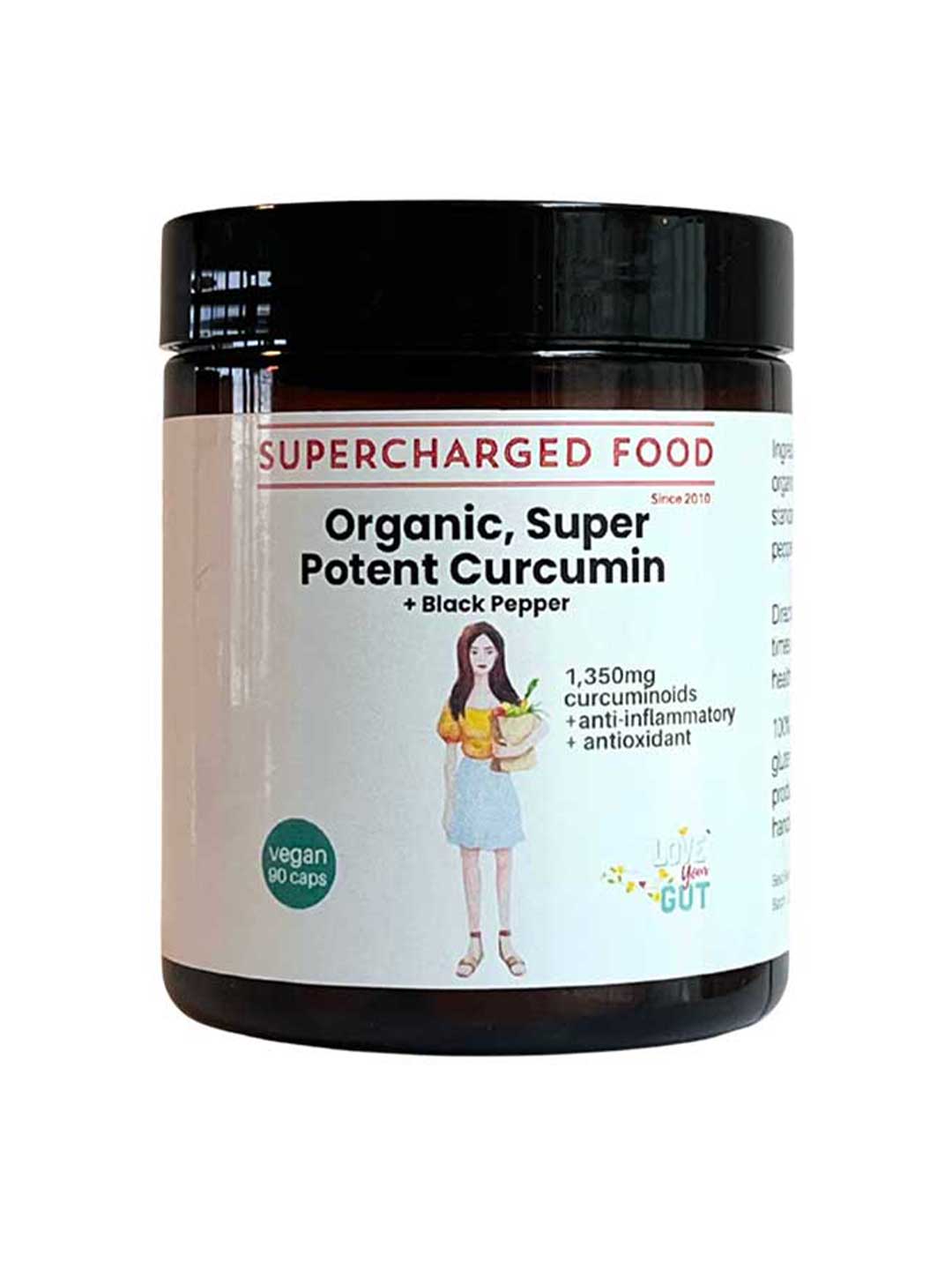Supercharged Food Love Your Gut Super Potent Curcumin and Black Pepper 90 Caps delivers 1,350mg curcuminoids per serve; it's vegan, organic turmeric-based, and supports antioxidant and gut health. The packaging features a woman with a bowl.