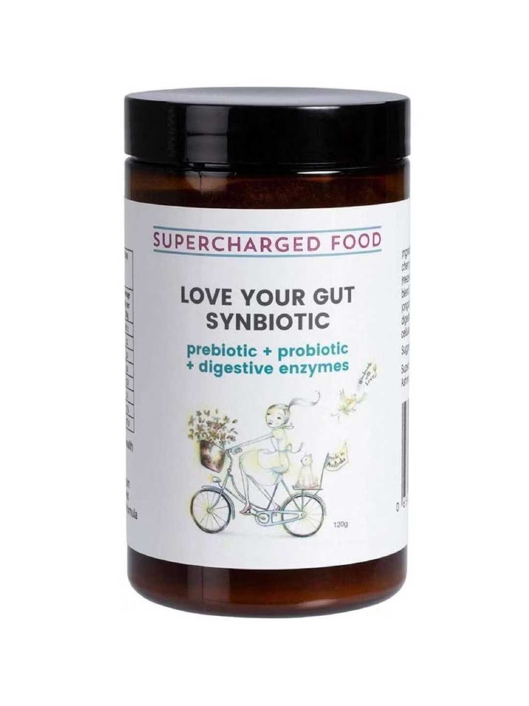 A brown jar labeled Supercharged Food Love Your Gut Synbiotic Powder 120g, featuring prebiotics, probiotics, and digestive enzymes. The label shows a person riding a bicycle with flowers.