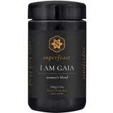 A black jar labeled Superfeast I Am Gaia 100g, with gold text and logo on a dark background—crafted as a tonic herbal blend designed to support women’s health.