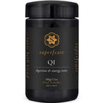 A black jar labeled Superfeast QI 100g digestion & energy tonic with gold accents contains 100g (3.5oz) of oral powder. The label features the Superfeast logo, herb blend details, and highlights it as a Qi tonic blend for vitality.