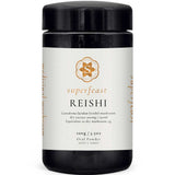 A black jar of Superfeast Reishi 100g Powder with a screw-top lid, labeled as Ganoderma lucidum (reishi) extract and dry mushroom equivalence, known for immune system support. Contains 100g of oral Reishi mushroom powder.