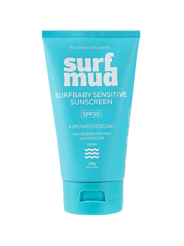Bright turquoise Surfmud Surfbaby Sensitive SPF30 sunscreen tube standing on its matching flip-top cap, with bold stacked white 'surf mud' lettering above the product details.