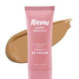 A pink tube of RAWW Vitamin C BB Cream 30ml stands before a tan smear, highlighting its shade. This hydrating balm helps deliver a luminous complexion.