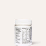 Rear view of the white The Beauty Chef Glow Ageless jar beneath its ribbed white lid, showing a nutrition table, serving instructions and product information in small black print.