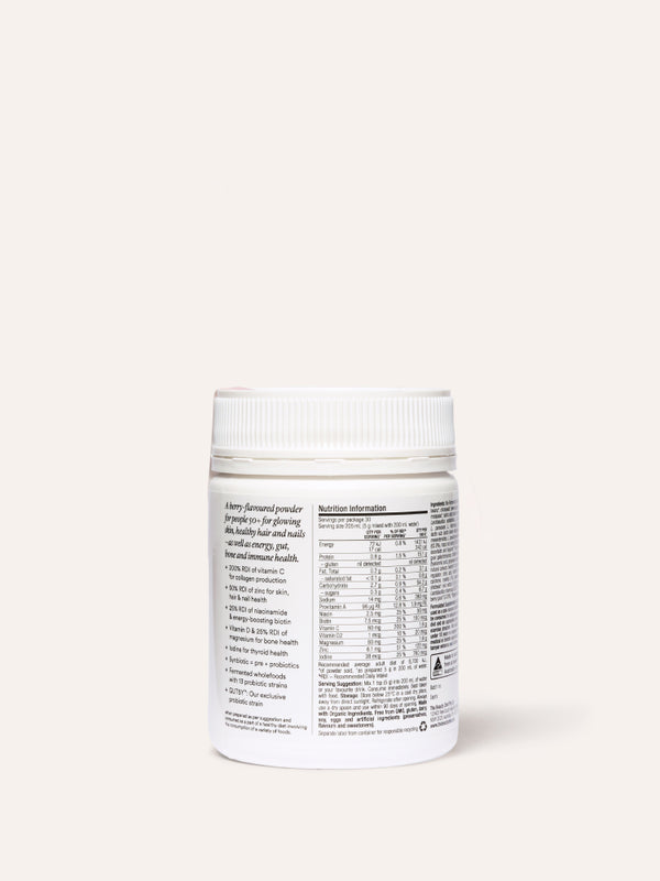Rear view of the white The Beauty Chef Glow Ageless jar beneath its ribbed white lid, showing a nutrition table, serving instructions and product information in small black print.