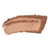 A curved smear of light brown 100% Pure Rice Powder Foundation 9g in the shade Toffee is shown on a white background.