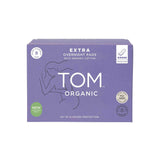 A purple box of TOM Organic Pads Extra Overnight 8pk with organic cotton, showing a simple woman’s outline, product info, and icons for 8 heavy flow pads, 12-hour protection, and use of organic cotton.