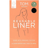 The TOM Organic Reusable Liner comes in an orange box with a minimalist woman illustration, a green organic certification logo, and text highlighting non-toxic sanitary pads made with organic cotton and a plant-based absorbent core for 4-layer protection.