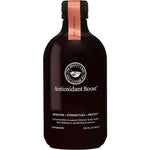 The Beauty Chef Antioxidant Boost™ 500ml is a dark bottle with a pink cap and label, promoting skin brightening, strengthening, and protection. This strawberry-flavored probiotic elixir includes elderberry, prebiotics, and selenium.