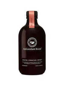 The Beauty Chef Antioxidant Boost™ 500ml is a dark bottle with a pink cap and label, promoting skin brightening, strengthening, and protection. This strawberry-flavored probiotic elixir includes elderberry, prebiotics, and selenium.