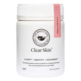 A white container of The Beauty Chef Clear Skin™ Berry 150g with a pink-labeled lid. This fermented supernutrient powder supports gut and skin health, and is formulated to clarify and decongest blemish-prone skin.