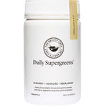 A white container of The Beauty Chef Daily Supergreens Inner Beauty Support Pineapple 150g features text on cleansing, alkalizing, and rebalancing. This pineapple-flavored supergreens powder contains probiotics for gut health support.
