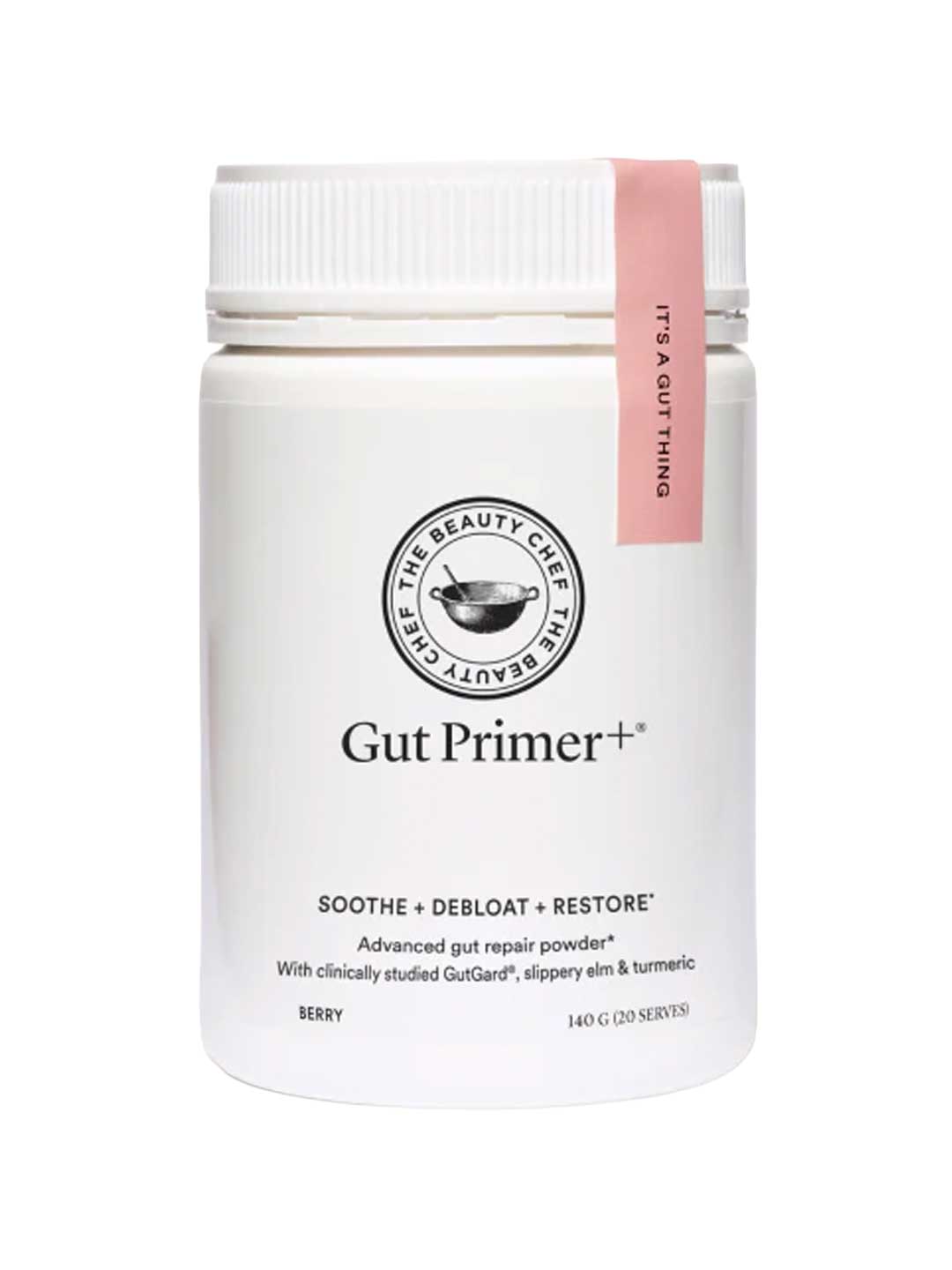 A white container of The Beauty Chef GUT PRIMER+® 140g with a pink tag on the lid. The label highlights “Soothe, Debloat, Restore” and describes it as an advanced gut health powder with GutGard for abdominal bloating relief.