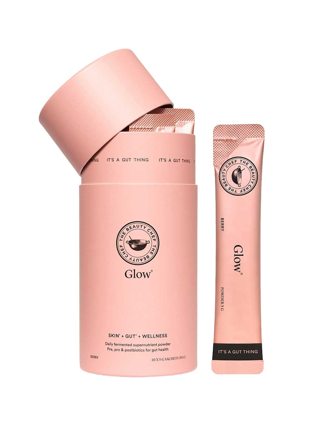 An open pink cylindrical container labeled The Beauty Chef Glow® Sachets 10x 5g reveals individual pink sachets, with one upright beside it. The packaging highlights gut health and Skin + Gut + Wellness for radiant skin.