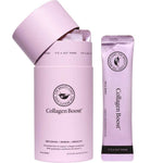 A cylindrical pink container labeled The Beauty Chef Collagen Boost™ Sachets 10 x 15ml, with its lid open beside a single pink stick packet. Both display the logo, promote vegan collagen benefits, and are marked Wild Berry flavor.