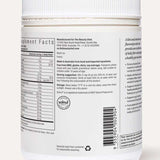 A white plastic container of The Beauty Chef The Perfect Poo™ 270g shows a nutrition label, ingredients, and manufacturer details. A barcode and recycling symbol are visible near the bottom.