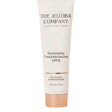 The Jojoba Company Illuminating Tinted Moisturiser SPF15 50ml, containing zinc, ectoin, and hyaluronic acid for hydration and redness reduction, is shown upright against a white background.