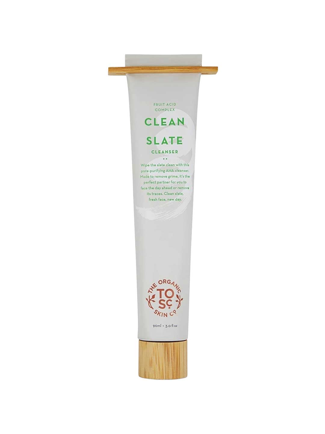 A 90ml white tube of The Organic Skin Co Clean Slate Cleanser with a wooden cap and base, green and orange text, and logo—a natural brightening cleanser that leaves skin radiant and refreshed.