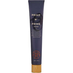 A dark purple 60ml tube labeled "The Organic Skin Co Primp N' Prime Face Primer," with a bamboo cap, product description, and an orange logo near the bottom, highlighting its vegan makeup primer formula.