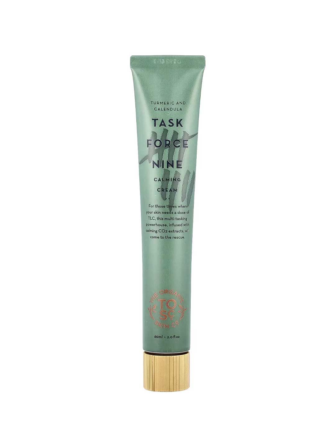 A green tube labeled The Organic Skin Co Task Force Nine Calming Cream 60ml with a gold cap, ideal for sensitive skin. Made with turmeric and calendula, its minimal design features text and a small logo at the bottom.