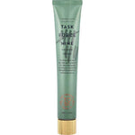 A green tube labeled The Organic Skin Co Task Force Nine Calming Cream 60ml with a gold cap, ideal for sensitive skin. Made with turmeric and calendula, its minimal design features text and a small logo at the bottom.