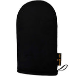 The Three Warriors Eco Friendly Tanning Mitt is a black mitt with a rounded top, hanging loop, and black-and-gold side tag, designed for streak-free self-tanning mousse application. Shown on a plain white background.