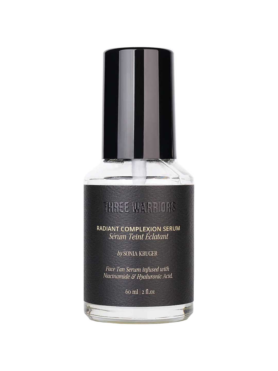 A clear glass bottle with a black cap labeled Three Warriors Radiant Complexion Face Tan Serum 60ml, featuring hydrating niacinamide and hyaluronic acid for a summer glow.