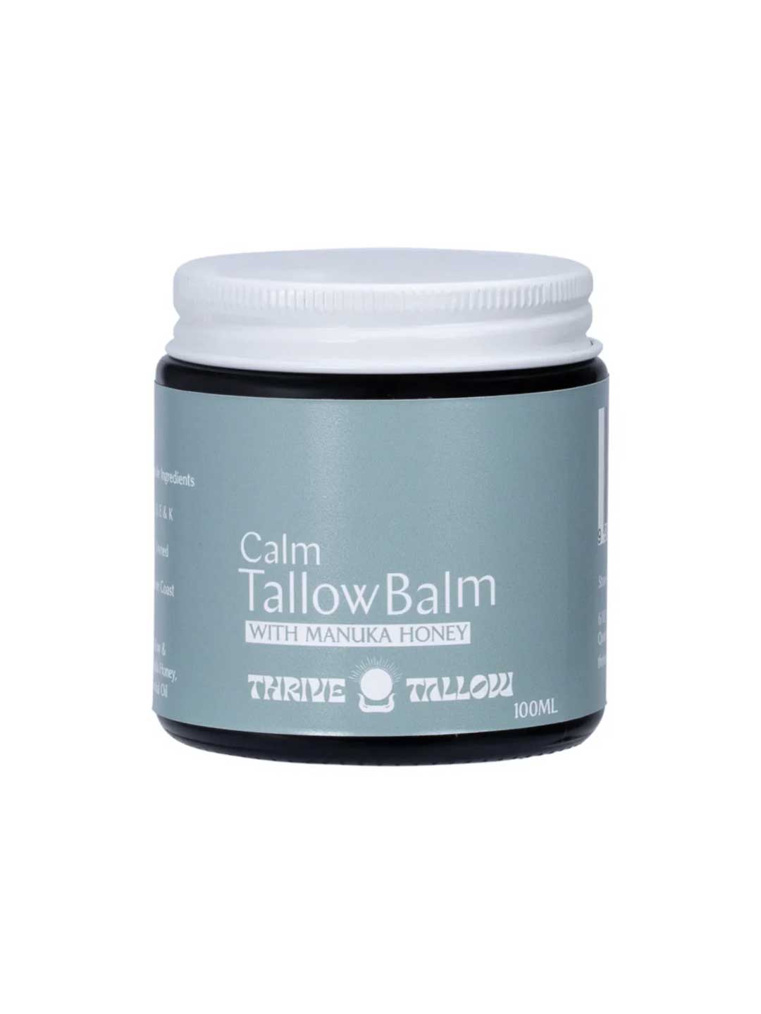 A 100ml jar of Thrive Tallow Calm Tallow Balm, with Manuka honey, light blue label, and white screw-on lid—ideal for sensitive skin.