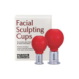 Two red Thrive Tallow Facial Sculpting Cups (2pcs) with clear bases sit in front of a box, highlighting benefits like improved circulation, better lymphatic flow, and reduced facial tension.