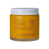 A 100ml jar of Thrive Tallow Vitamin C Glow Creme, a tallow moisturizer with yellow-orange cream in a frosted glass container, featuring Kakadu plum, rosehip, and sea buckthorn for radiant skin.