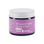 A 70ml jar of Thrive Tallow Whipped Tallow Moisturiser Ylang Ylang & Vanilla, with a purple label highlighting whipped balm benefits in white text and a white screw lid.
