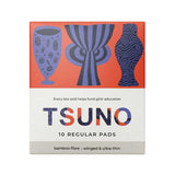 A box of Tsuno Natural Bamboo Pads Regular Winged & Ultra Thin 10pk features biodegradable pads with abstract blue vase designs on an orange background. Each purchase helps fund girls’ education.