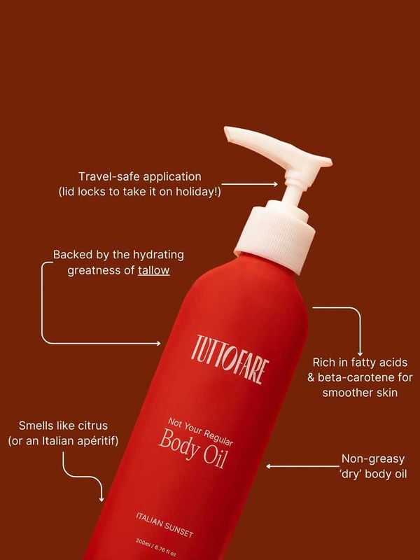 A red bottle of Tuttofare Not Your Regular Body Oil 200ml with a white pump stands against a brown background. White text notes the travel-safe lid, beef tallow hydration, citrus scent, non-greasy feel, rich fatty acids, and natural moisturizing power.