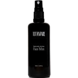 A black spray bottle of Tuttofare Naturally Active Face Mist 100ml is displayed against a plain white background.