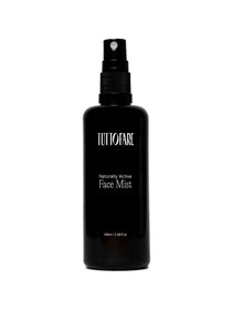 A black spray bottle of Tuttofare Naturally Active Face Mist 100ml is displayed against a plain white background.