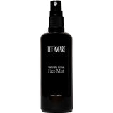 A black spray bottle of Tuttofare Naturally Active Face Mist 100ml is displayed against a plain white background.