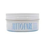 Low, round white Tuttofare Roman Blue Tallow Balm tub with a ridged screw-top lid and large pale blue lettering.