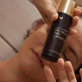 Model holding Vanessa Megan Bio-Omega Contouring Body Oil