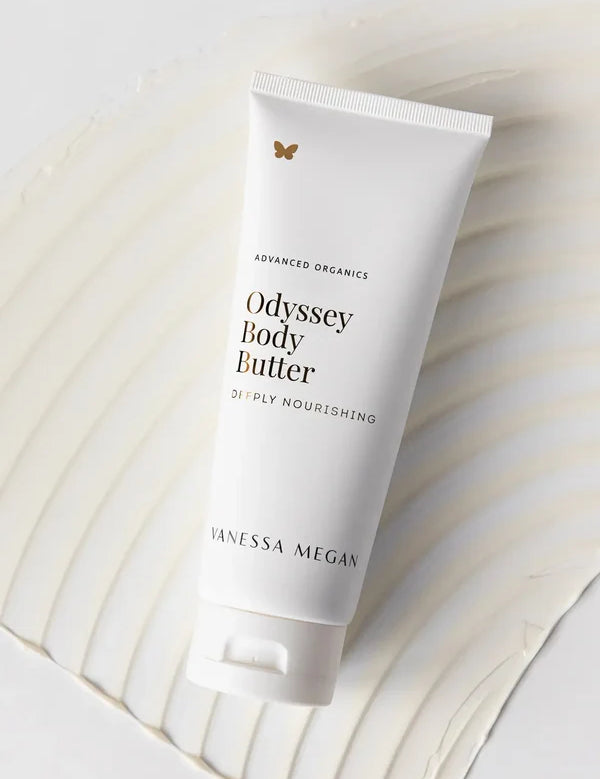 Vanessa Megan Odyssey Body Butter tube on textured backdrop